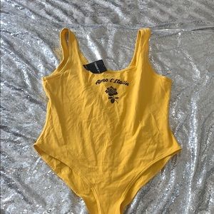Yellow bodysuit